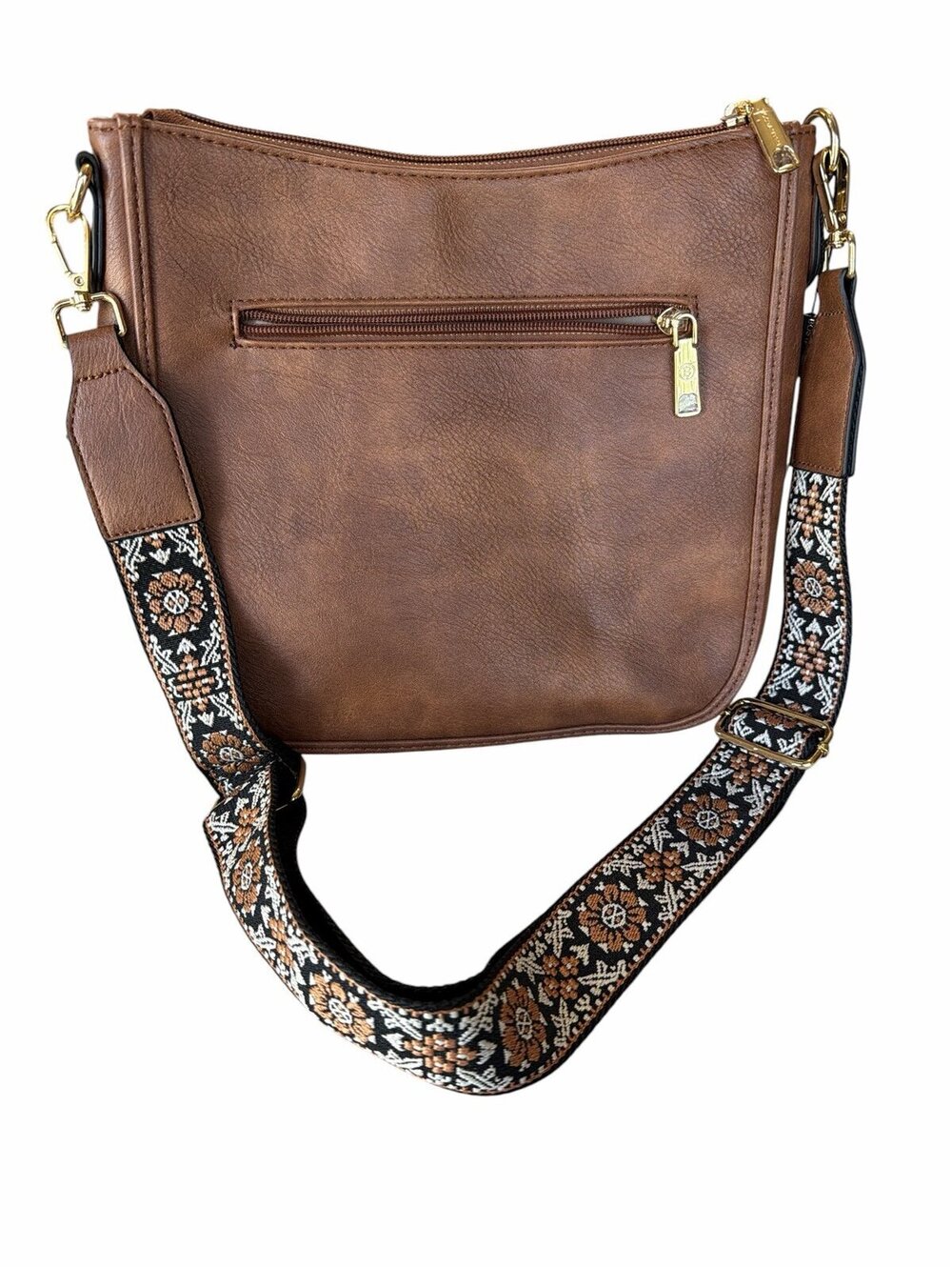 Brown crossbody bag with patterned strap